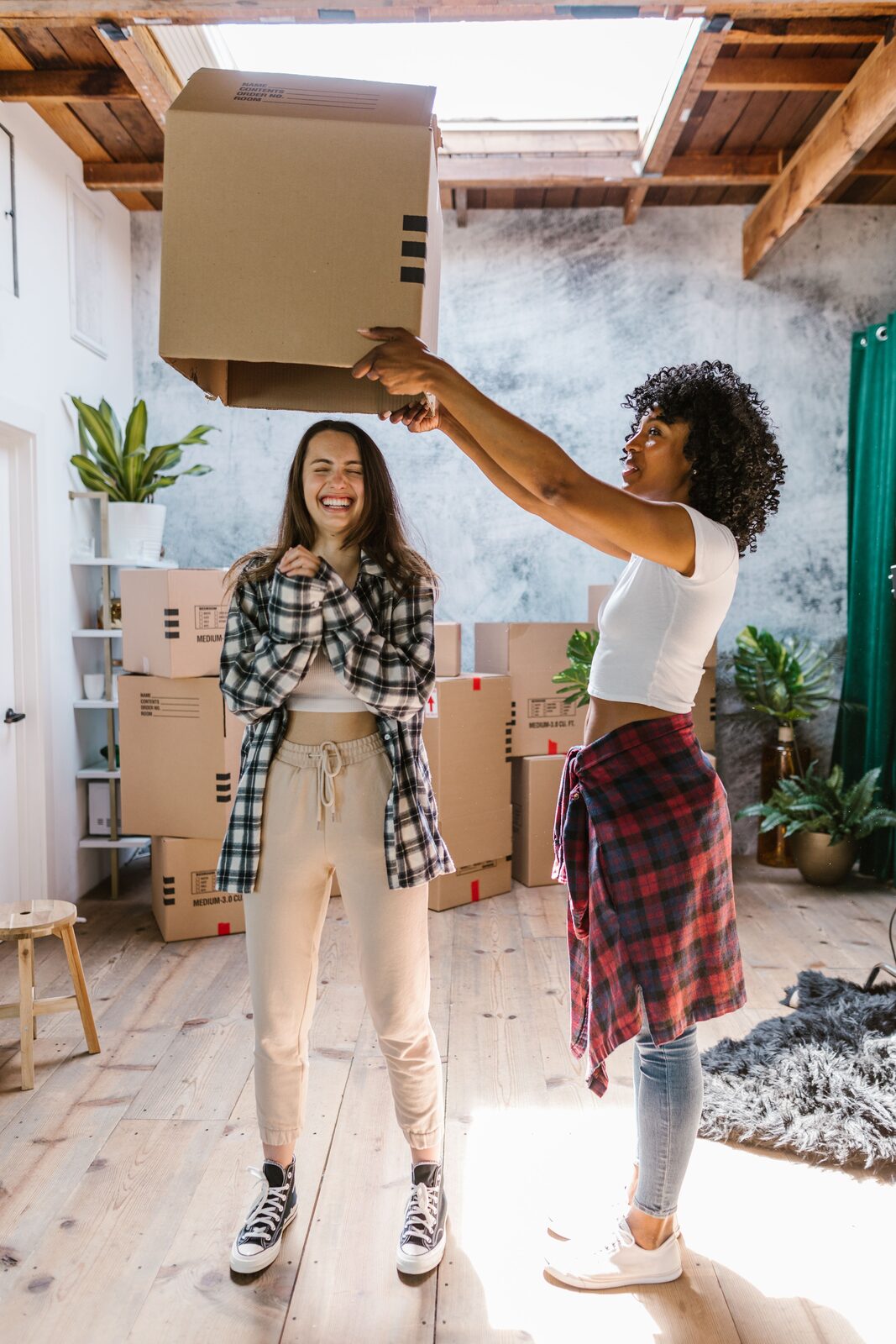 Friends helping one another during a move